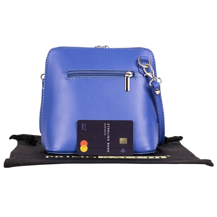 rear of womens small italian leather should bag in a lavender colour with debit card for scale