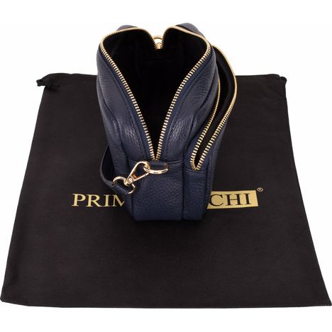 side and above view of an open small navy blue leather shoulder crossbody bag with black interior