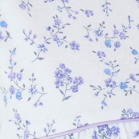 close up of the beautiful small flower pattern on a womens blue winter brushed cotton nightdress