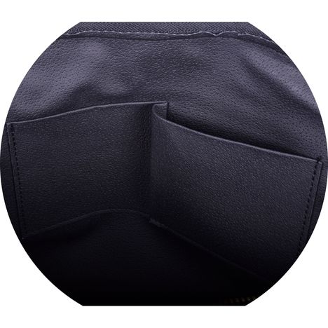 close up of two internal patch pockets in a large womens black italian leather handbag