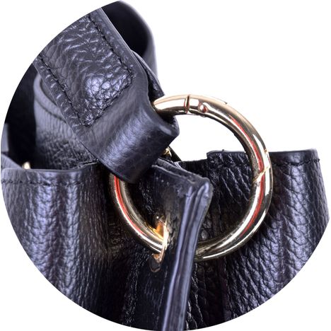 gold metal clip ring for the handle on a black italian leather tote bag