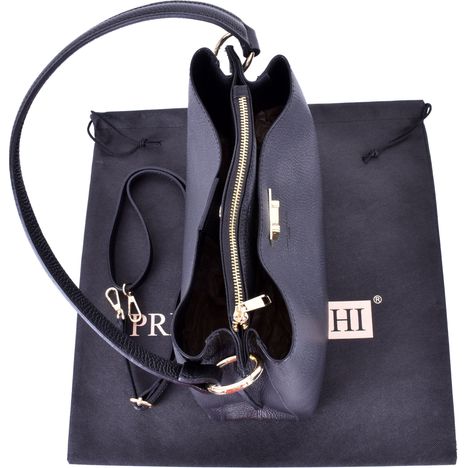 above a black grab bag showing the handle and gold metalwork including zip and flip lock