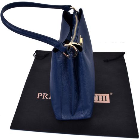 side and above view of a closed womens dark blue italian leather tot bag with gold metal ware