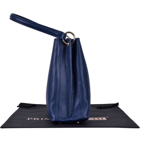 side view of womens large dark blue italian leather grab bag with chunky gold metal strap ring 