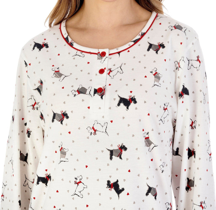 the top half of cream cotton nightdress with scottie dog pattern round neck & long sleeves