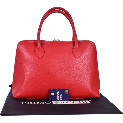 rear view  with a credit card to show the size of a womens large read itallian leather handbag