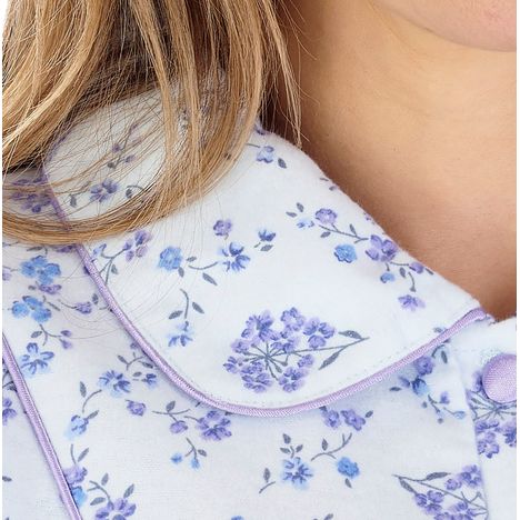 close up of a rounded collar with satin trim on an elderly ladies luxury soft cotton nightdress 