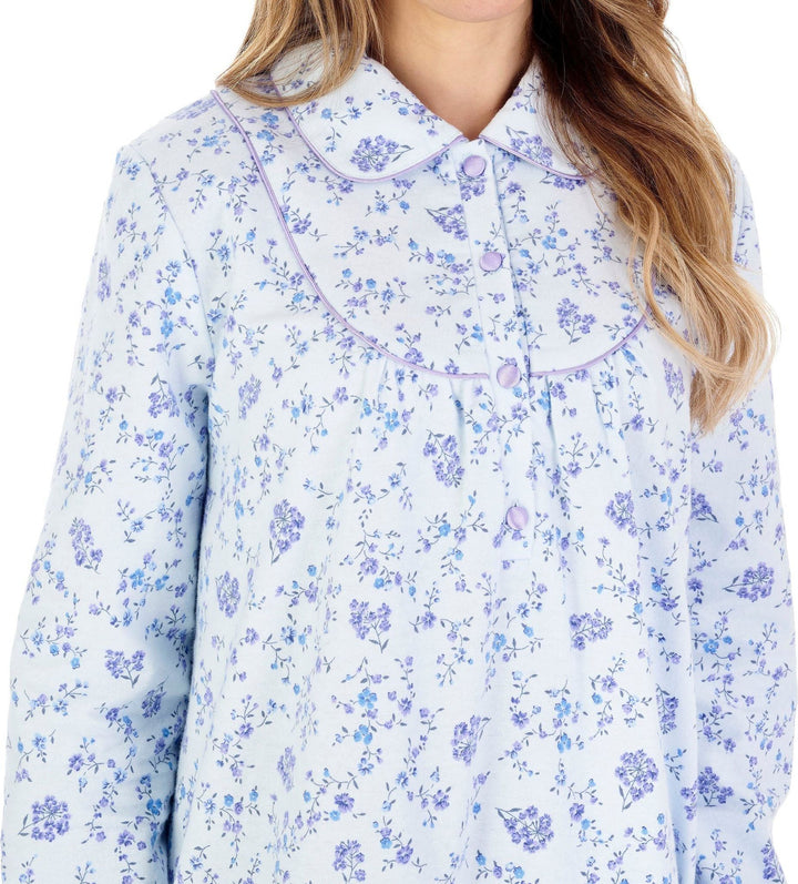 top half of elderly ladies luxury winter soft brushed cotton nightdress in pale blue & small flowers
