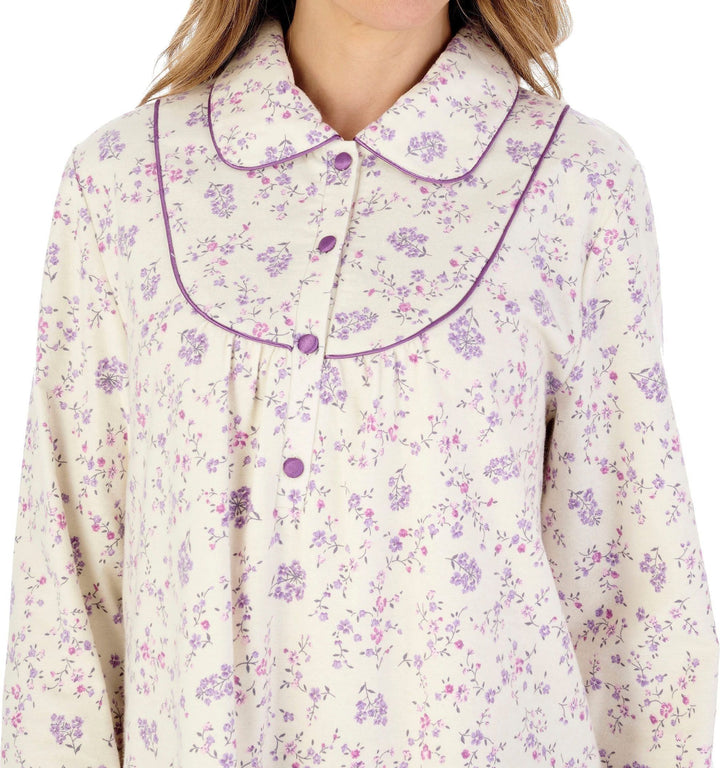 top half of older womens cream floral winter nightdress in soft brush cotton long sleeves