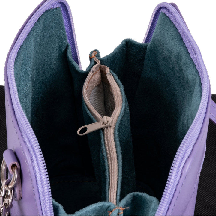 close up of the inside of a womens lilac italian leather small shoulder crossbody bag