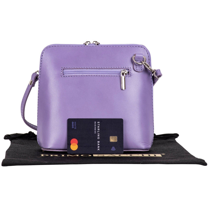 rear of womens lilac italian leather small shoulder crossbody bag with debit card to show size