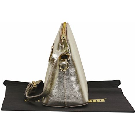 side view showing triangle shape of womens gold italian leather shoulder and cross body bag