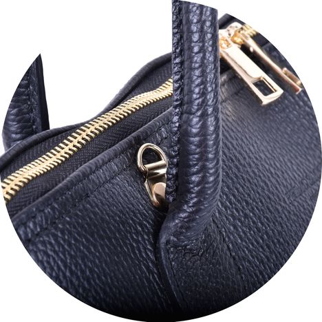 close up of gold metal shoulder strap hoop on a ladies large grab bag in black italian leather