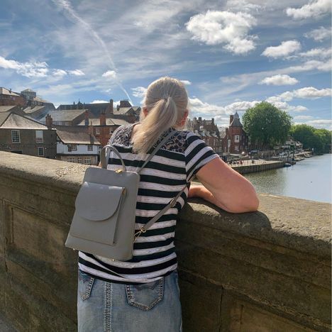 angela of primo sacchi modelling the primo sacchi romana bag on her back in york england